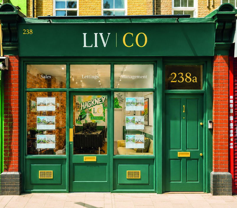 Green Storefront with Liv|co Sign and Address 238a Windows Show sales lettings management and an Interior Meeting Area Seen Inside the Office | Livco Estate Agents